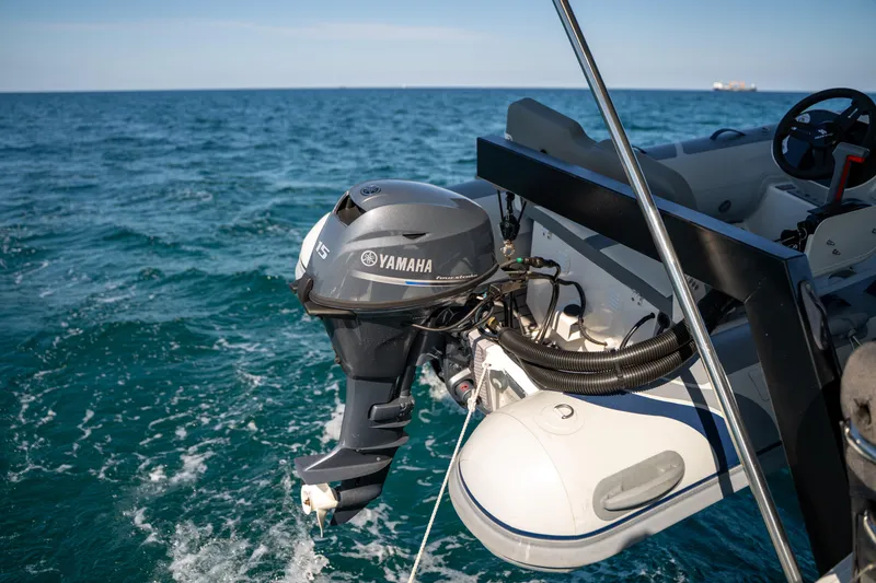 Slide: The Image of Yamaha outboard motor on a 2025 Fountaine Pajot FP41 Catamaran in open sea. - 69