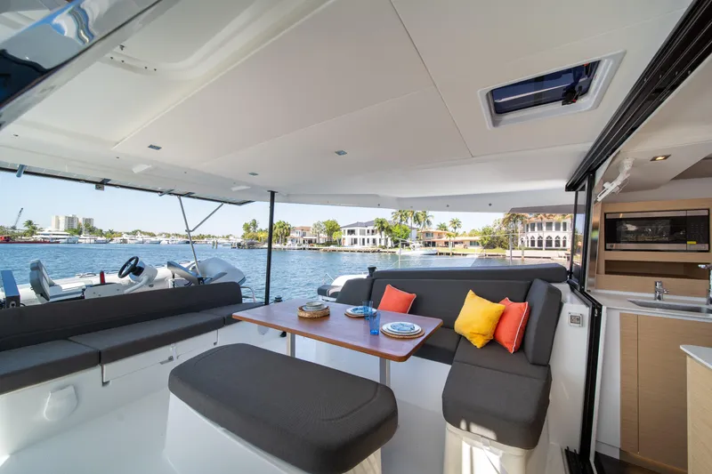 Slide: The Image of Luxurious interior of 2025 Fountaine Pajot New 41 catamaran with waterfront view. - 78