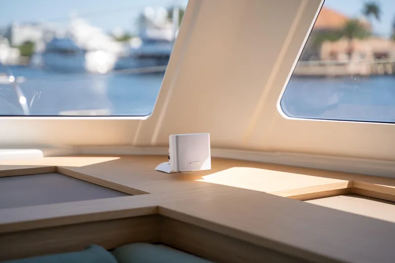 Slide: The Image of Interior of 2025 Fountaine Pajot New 41 yacht with modern design and large windows. - 84