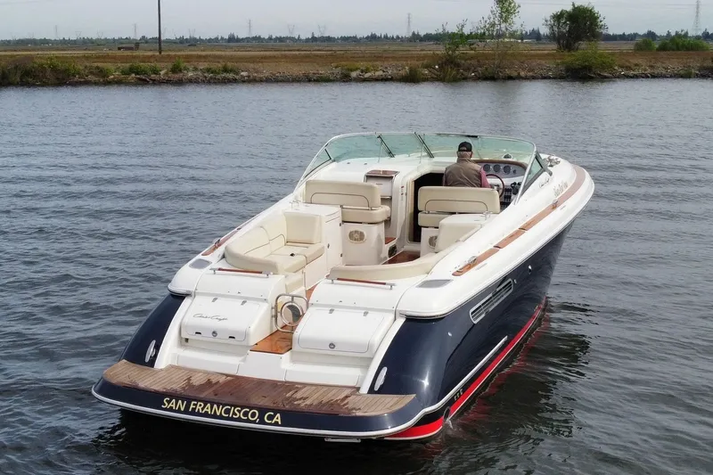 Slide: The Image of 2008 Chris-Craft Corsair 36 Heritage Edition boat cruising on water near San Francisco. - 3
