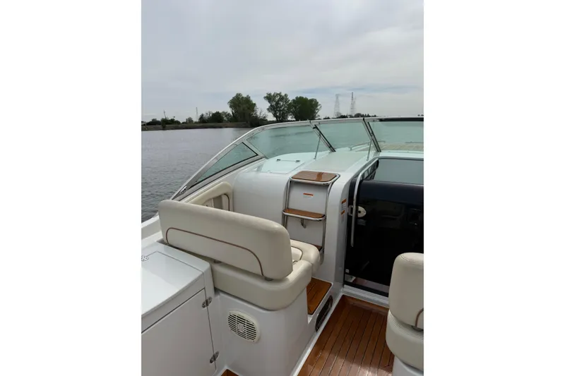 Slide: The Image of 2008 Chris-Craft Corsair 36 Heritage Edition boat interior with seating and water view. - 8