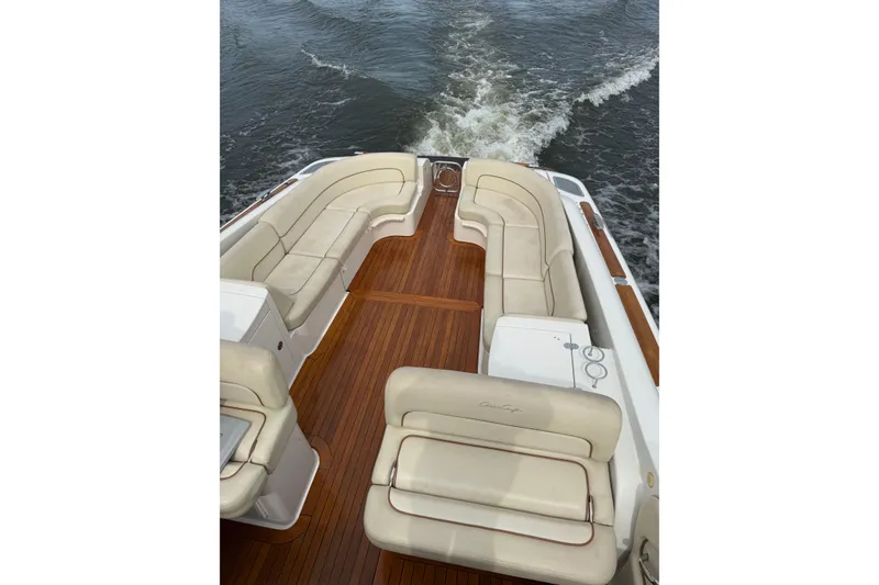 Slide: The Image of 2008 Chris-Craft Corsair 36 Heritage Edition boat with elegant seating and teak deck. - 9