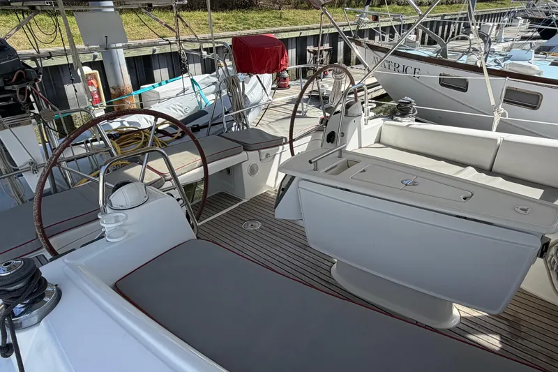 Slide: The Image of Spacious cockpit of a 2008 Beneteau 43 sailboat with dual steering wheels. - 18