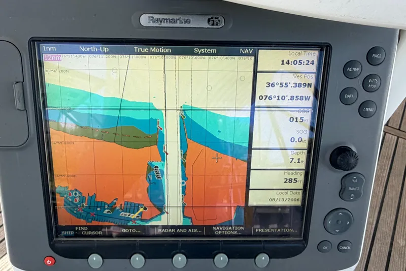 Slide: The Image of Raymarine navigation display on a 2008 Beneteau 43, showing nautical chart and coordinates. - 30