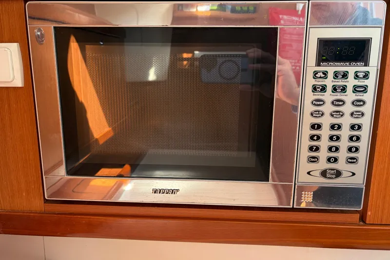 Slide: The Image of Tappan microwave oven in a 2008 Beneteau 43 yacht kitchen setting. - 45