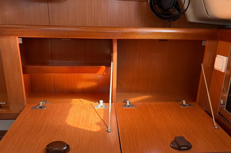 Slide: The Image of Wooden interior storage compartments on a 2008 Beneteau 43 yacht. - 46