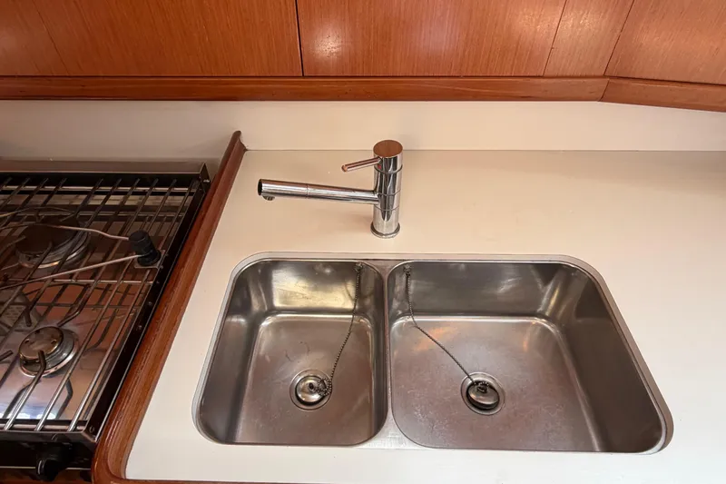 Slide: The Image of Galley sink and stove in 2008 Beneteau 43 yacht kitchen. - 49