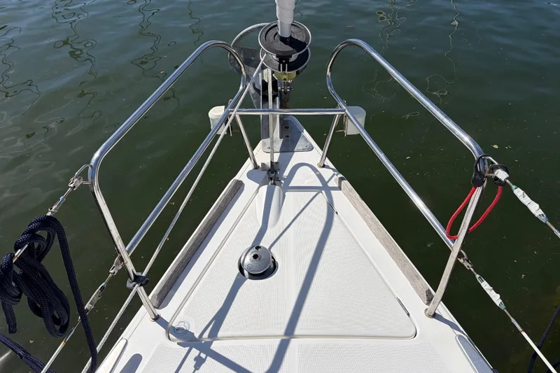 Slide: The Image of Bow of a 2008 Beneteau 43 sailboat with stainless steel railings. - 5