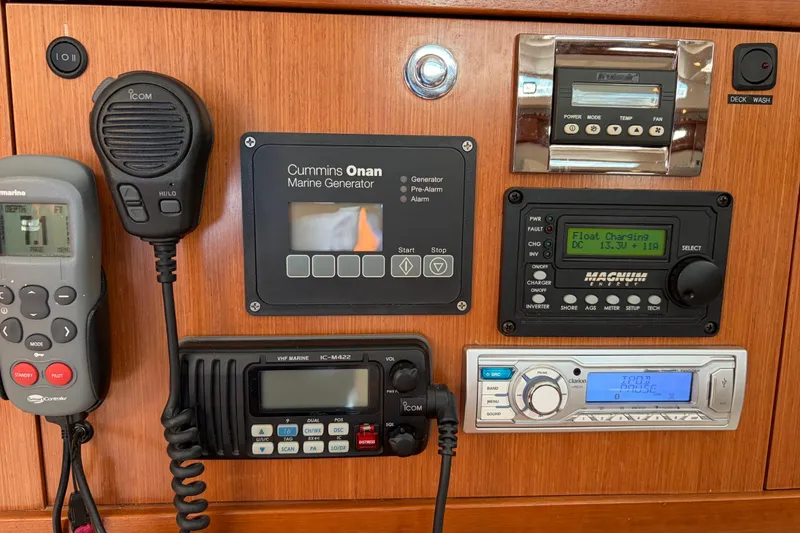 Slide: The Image of Control panel of a 2008 Beneteau 43 yacht with marine electronics and generator. - 53