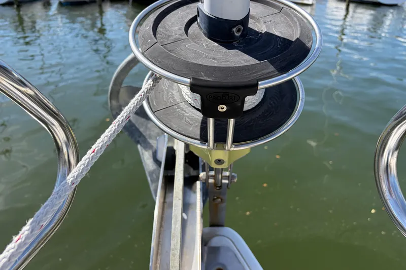 Slide: The Image of Close-up of a Beneteau 43 sailboat's furling system, 2008 model, on calm water. - 6