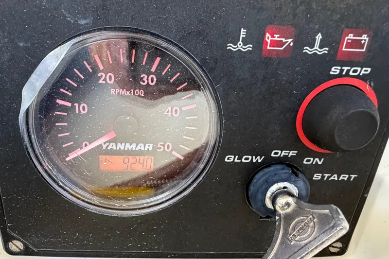 Slide: The Image of Yanmar engine control panel on a 2008 Beneteau 43 sailboat. - 69
