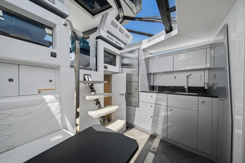 Slide: The Image of Modern interior of Dutch American DA 53 yacht, featuring sleek kitchen and seating area, 2026 model. - 39