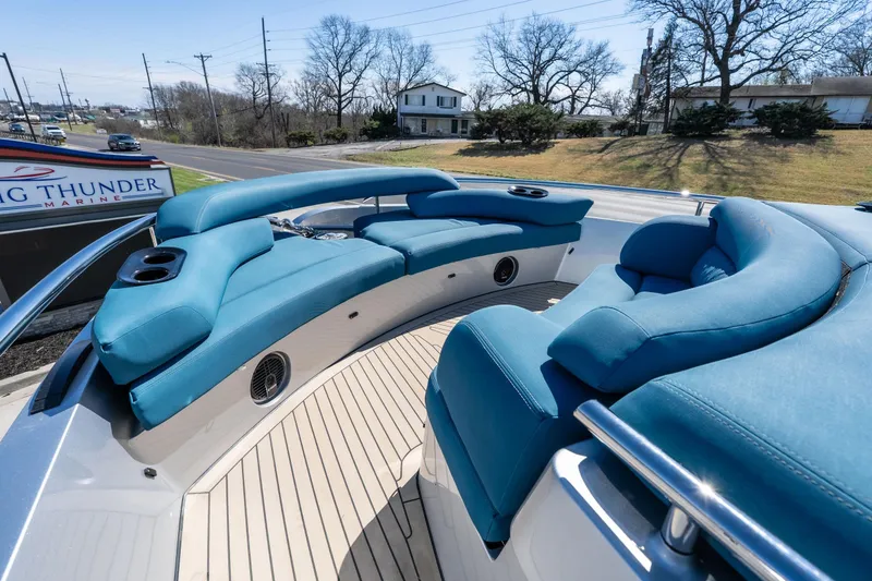 Slide: The Image of Luxurious 2026 Dutch American DA 53 boat with blue seating and sleek design. - 14