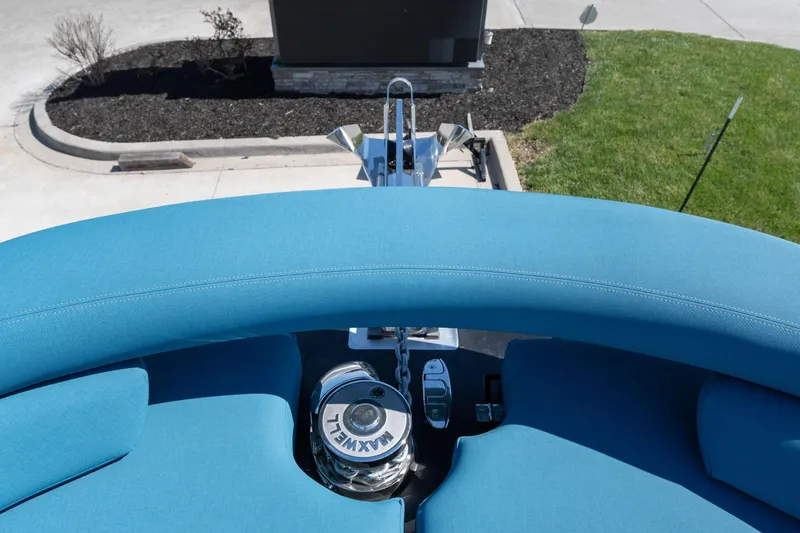 Slide: The Image of 2026 Dutch American DA 53 boat with blue seating and anchor mechanism. - 17