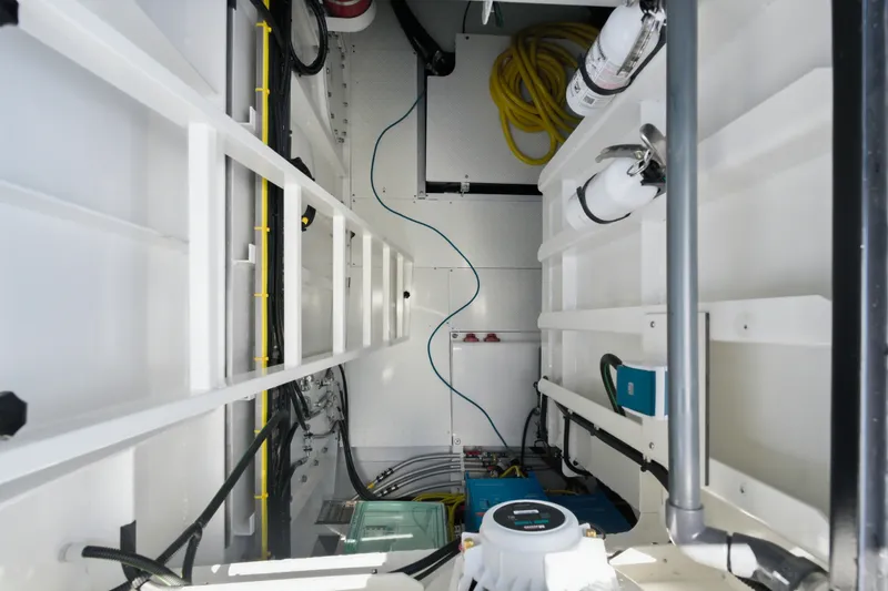 Slide: The Image of Interior view of Dutch American DA 53, 2026 model, showcasing equipment and wiring. - 64