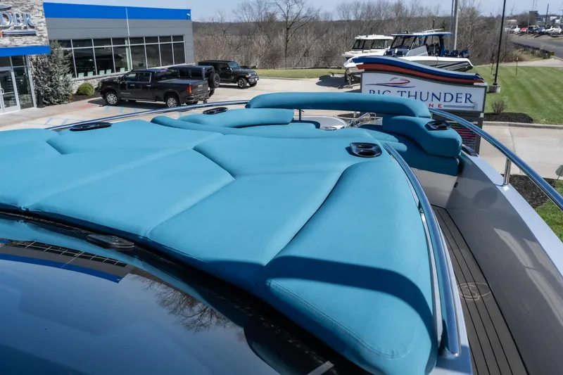 Slide: The Image of Luxurious Dutch American DA 53 yacht with blue sunbathing cushions, 2026 model, at marina. - 19