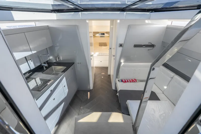 Slide: The Image of Modern interior of 2026 Dutch American DA 53 yacht with sleek kitchen and seating area. - 21