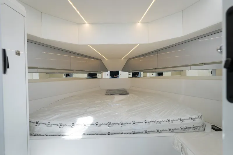 Slide: The Image of Modern interior of 2026 Dutch American DA 53 with sleek white design and ambient lighting. - 22