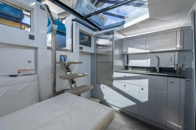 Slide: The Image of Modern interior of 2026 Dutch American DA 53 yacht with sleek kitchen and skylight. - 24