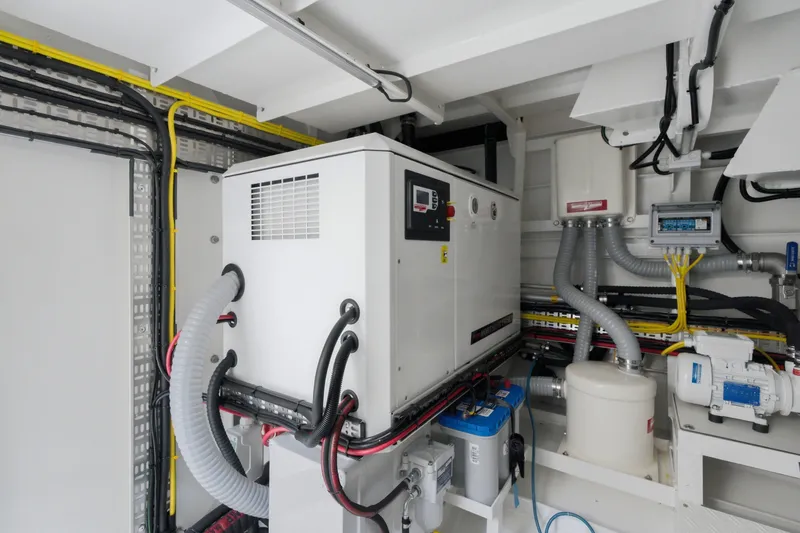 Slide: The Image of Modern engine room with Dutch American DA 53 equipment, featuring advanced wiring and control systems. - 66