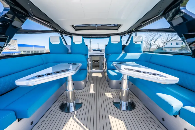 Slide: The Image of Luxurious interior of 2026 Dutch American DA 53 yacht with blue seating and modern tables. - 36