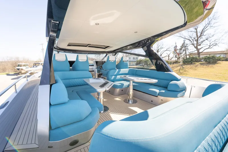 Slide: The Image of Luxurious 2026 Dutch American DA 53 yacht interior with modern blue seating and sleek design. - 38