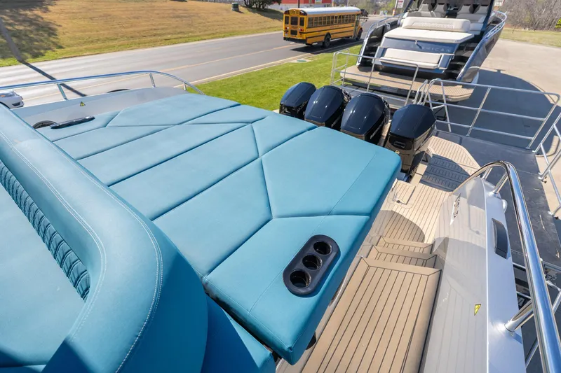 Slide: The Image of Luxury Dutch American DA 53 yacht with blue sunbed and powerful outboard engines, 2026 model. - 39