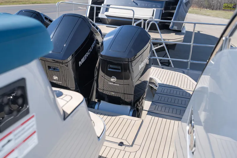Slide: The Image of 2026 Dutch American DA 53 boat with Mercury Verado outboard engines on deck. - 40