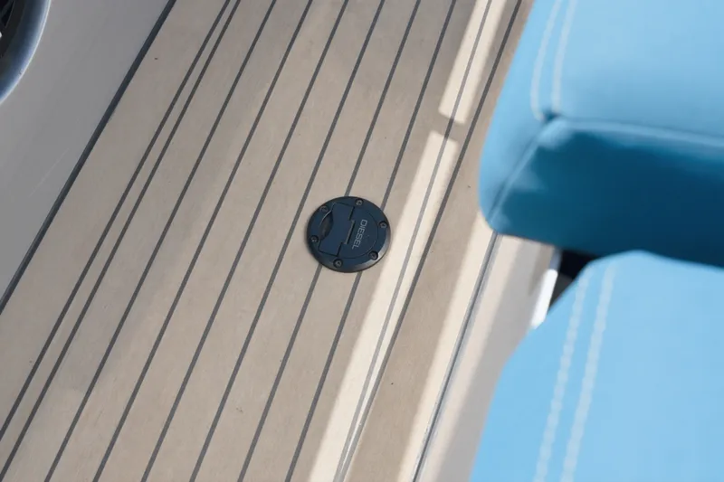 Slide: The Image of Deck of 2026 Dutch American DA 53 boat with blue seating and sleek design. - 76
