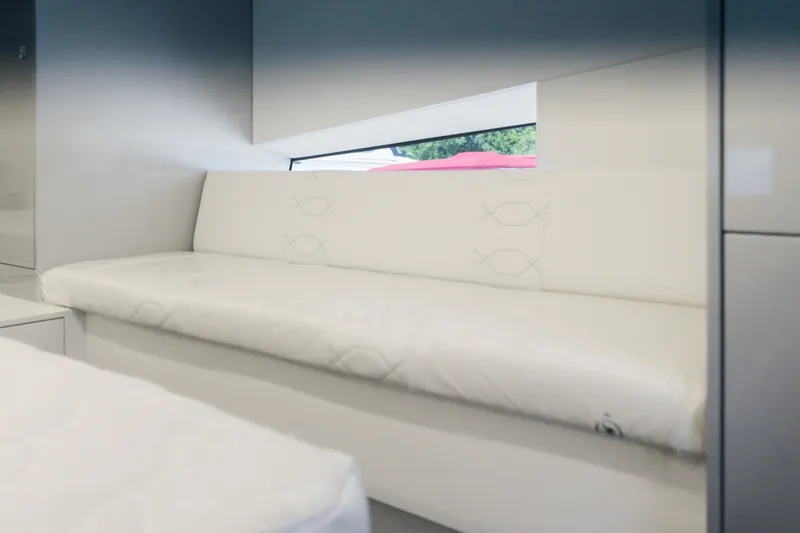 Slide: The Image of Luxurious interior of 2026 Dutch American DA 53 with sleek white seating. - 48
