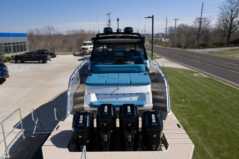 Slide: The Image of Luxury Dutch American DA 53 yacht, 2026 model, with powerful V12 engines, docked outdoors. - 5