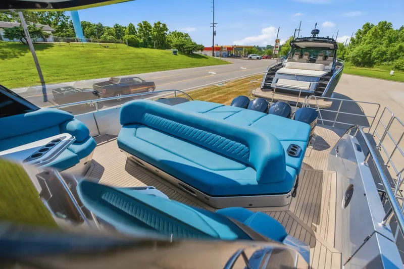 Slide: The Image of Luxurious 2026 Dutch American DA 53 yacht with blue seating, parked near a road. - 32