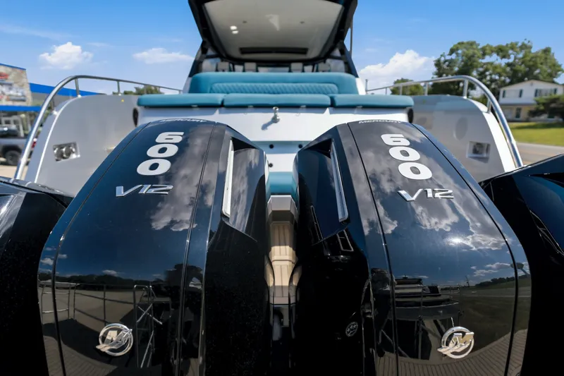 Slide: The Image of Twin 600 V12 outboard engines on a 2026 Dutch American DA 53 boat. - 8