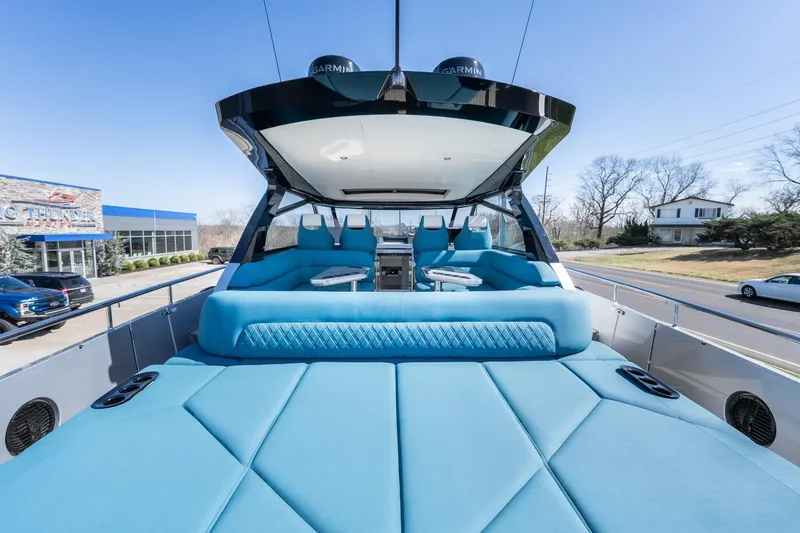 Slide: The Image of Luxurious 2026 Dutch American DA 53 yacht with spacious blue seating and modern design. - 7