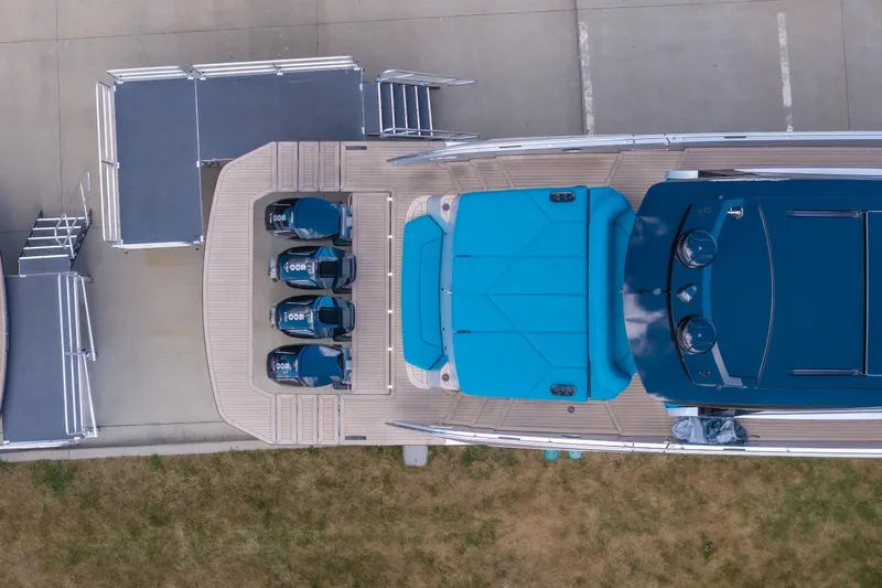 Slide: The Image of Aerial view of 2026 Dutch American DA 53 boat with blue seating and multiple engines. - 5