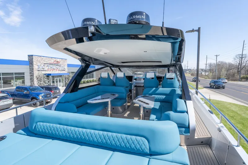 Slide: The Image of Luxurious 2026 Dutch American DA 53 yacht with spacious blue seating and modern design. - 8