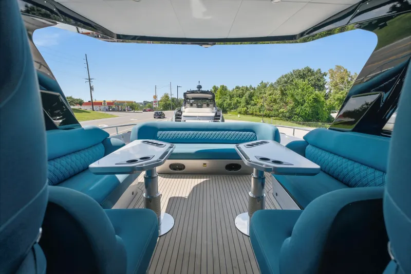 Slide: The Image of Luxurious interior of 2026 Dutch American DA 53 yacht with blue seating and tables. - 27