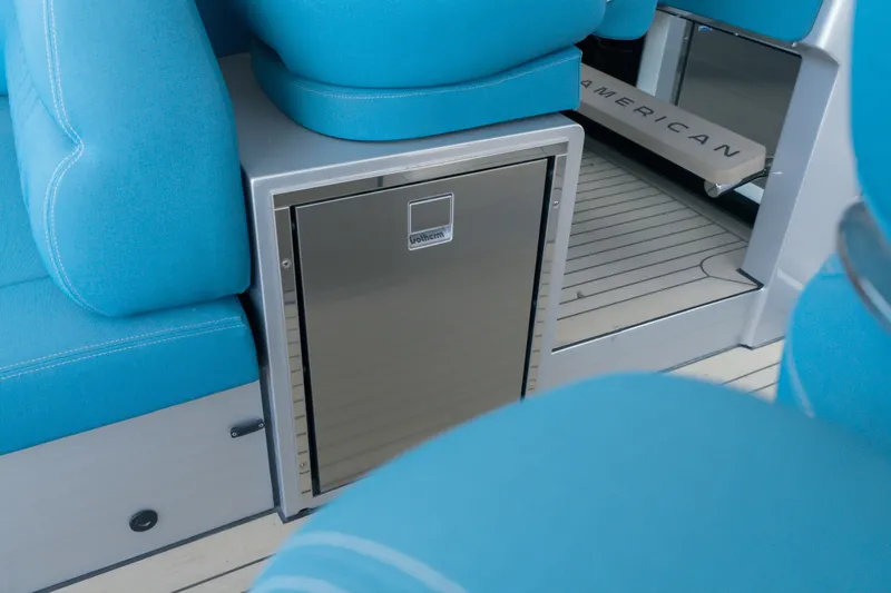 Slide: The Image of 2026 Dutch American DA 53 interior with blue seating and stainless steel compartment. - 60