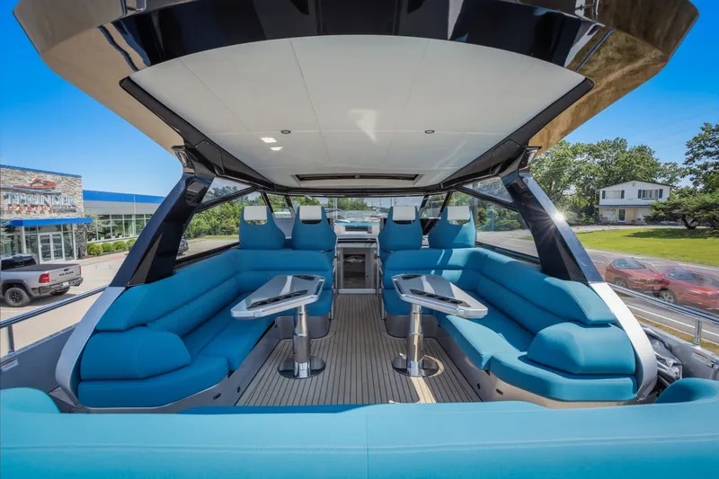 Slide: The Image of Luxurious 2026 Dutch American DA 53 yacht interior with modern seating and sleek design. - 25