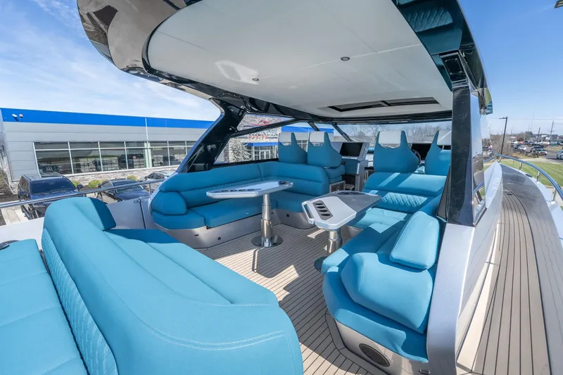 Slide: The Image of Luxurious 2026 Dutch American DA 53 yacht interior with blue seating and modern design. - 9