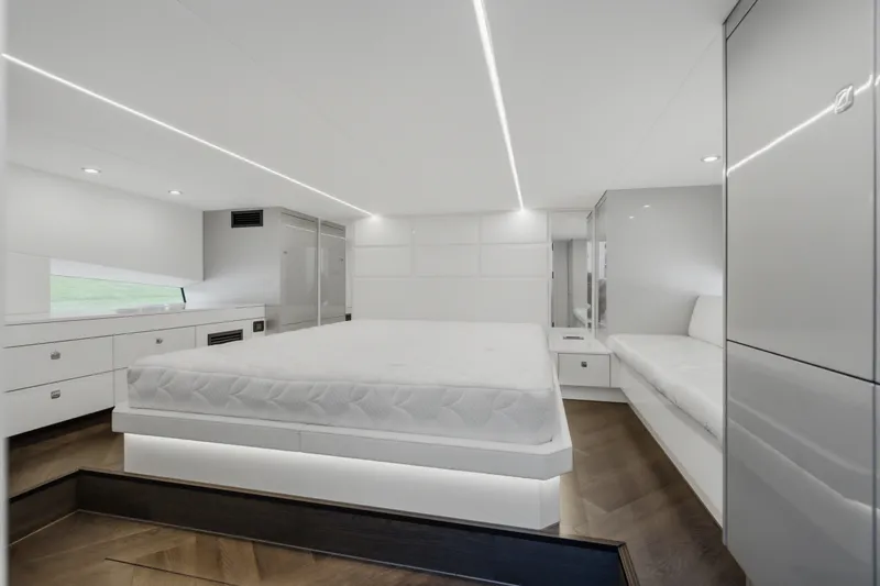 Slide: The Image of Luxurious modern bedroom in 2026 Dutch American DA 53 yacht, featuring sleek white design. - 45