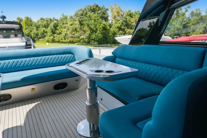 Slide: The Image of Luxurious seating area on 2026 Dutch American DA 53 yacht with modern design and blue upholstery. - 28