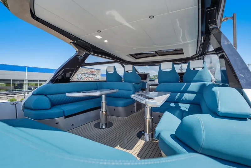 Slide: The Image of Luxurious 2026 Dutch American DA 53 yacht interior with blue seating and modern design. - 26