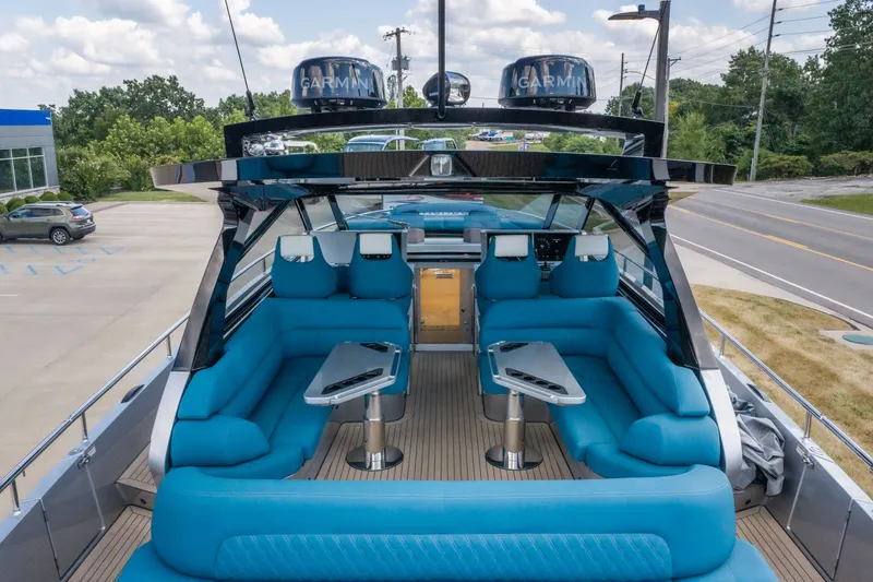 Slide: The Image of Luxurious 2026 Dutch American DA 53 yacht interior with blue seating and modern design. - 9