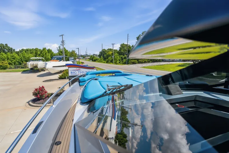 Slide: The Image of 2026 Dutch American DA 53 yacht at Big Thunder Marine dealership, sunny day. - 53
