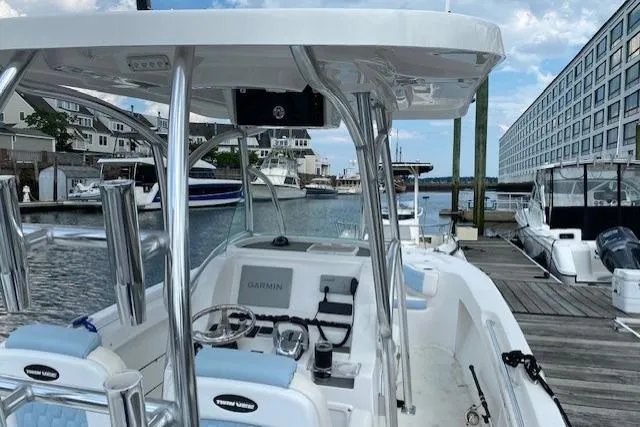 Slide: The Image of 2020 Twin Vee 260 CC SE boat docked at marina with clear sky. - 3