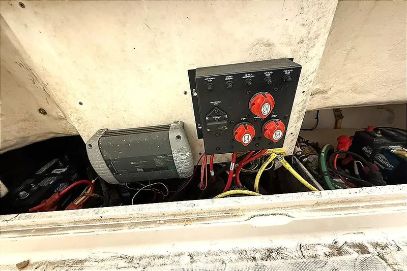 Slide: The Image of Electrical panel and wiring inside a 2005 Robalo R220 Center Console boat. - 2
