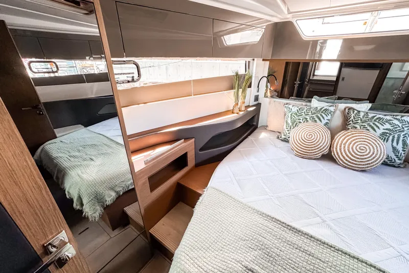 Slide: The Image of Luxurious interior of 2026 Wellcraft 44 Explorer yacht with stylish bedding and modern design. - 41