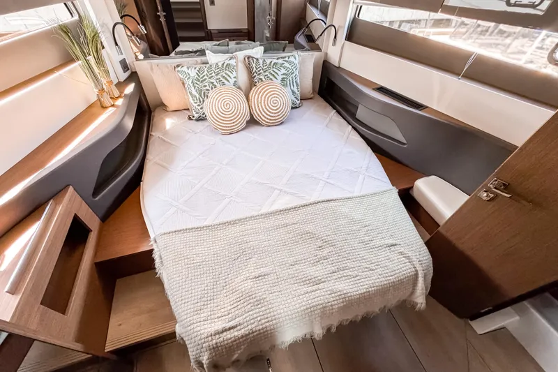 Slide: The Image of Luxurious bedroom interior of 2026 Wellcraft 44 Explorer yacht with elegant bedding and decor. - 40