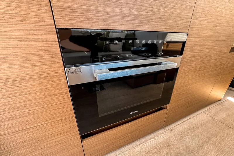 Slide: The Image of Modern built-in Miele oven in a Wellcraft 44 Explorer yacht, 2026 model. - 16
